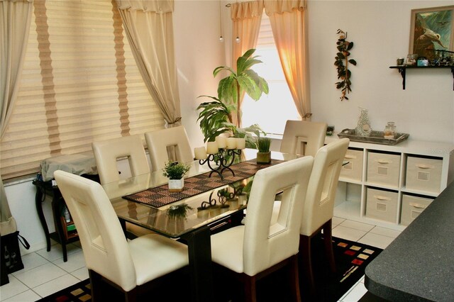 8735 SW 192nd Court Rd, Dunnellon, FL 34432 - dining space featuring light tile patterned flooring