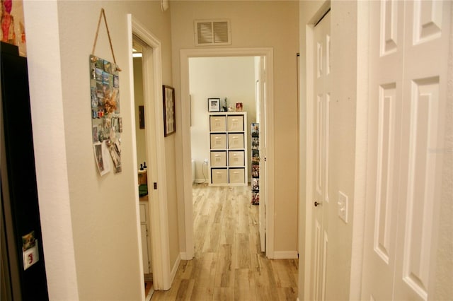 8735 SW 192nd Court Rd, Dunnellon, FL 34432 - corridor with light wood finished floors and baseboards