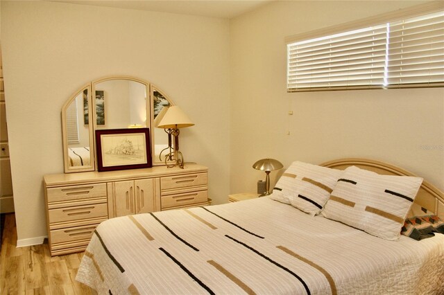 8735 SW 192nd Court Rd, Dunnellon, FL 34432 - bedroom featuring light wood-style floors