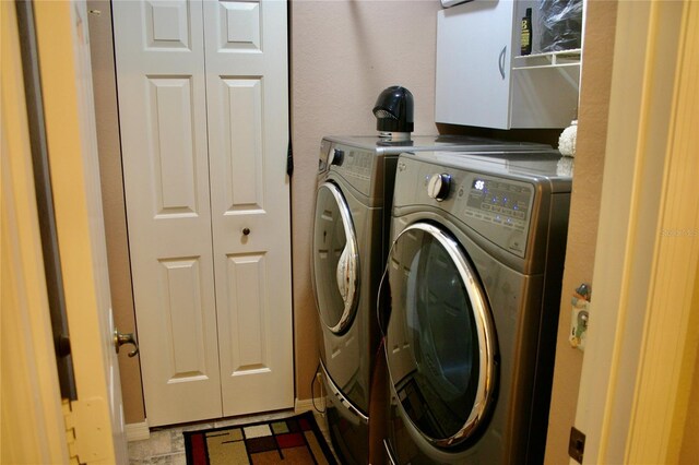 8735 SW 192nd Court Rd, Dunnellon, FL 34432 - washroom with washer and clothes dryer