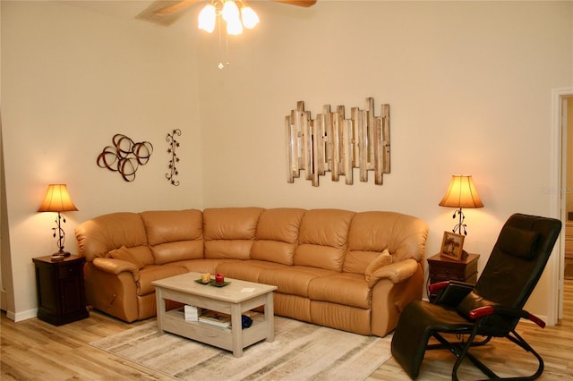 8735 SW 192nd Court Rd, Dunnellon, FL 34432 - living area featuring light wood-type flooring, ceiling fan, and baseboards