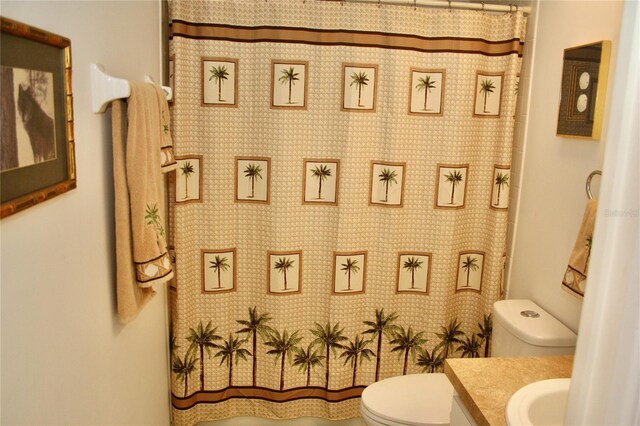 8735 SW 192nd Court Rd, Dunnellon, FL 34432 - full bathroom featuring toilet, vanity, and a shower with shower curtain