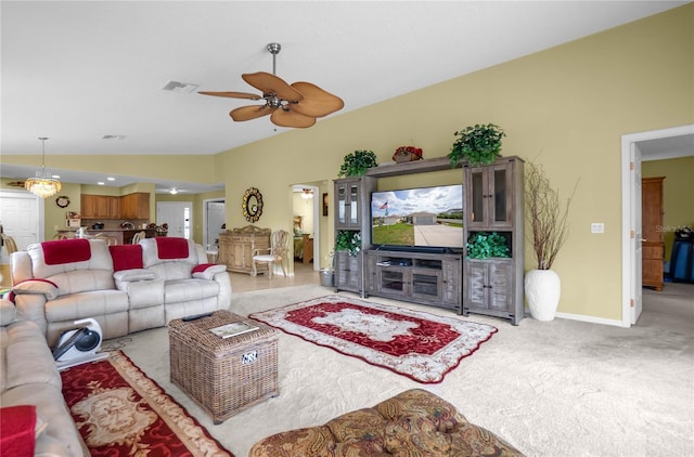 4692 N Lake Vista Trl, Hernando, FL 34442 - carpeted living room featuring a ceiling fan, vaulted ceiling, and baseboards