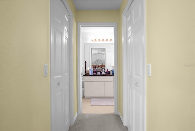 4692 N Lake Vista Trl, Hernando, FL 34442 - hallway with baseboards and light colored carpet
