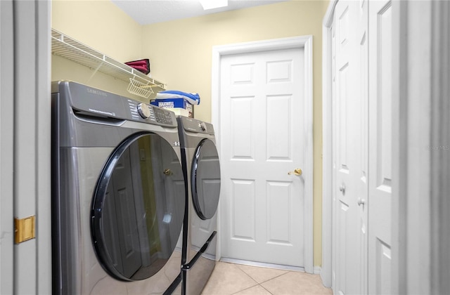 4692 N Lake Vista Trl, Hernando, FL 34442 - laundry room featuring separate washer and dryer and light tile patterned flooring