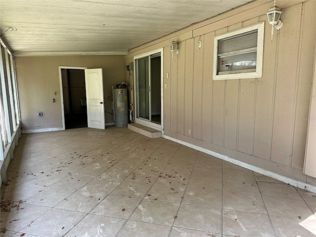 312 NW 28th St, Ocala, FL 34475 - unfurnished sunroom featuring electric water heater