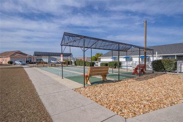 10444 S Clint Loop, Floral City, FL 34436 - surrounding community with shuffleboard and a residential view