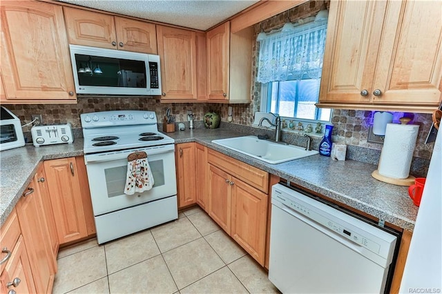 5626 W Justin Ct, Homosassa, FL 34448 - kitchen with white appliances, a sink, tasteful backsplash, and light tile patterned flooring