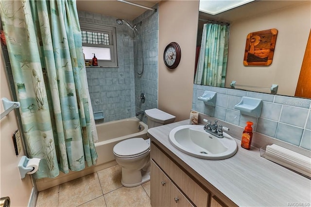 5626 W Justin Ct, Homosassa, FL 34448 - full bathroom with tile patterned floors, shower / tub combo with curtain, vanity, and toilet