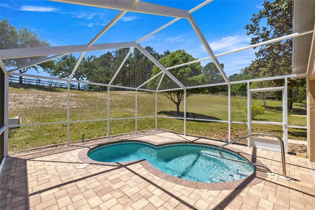 785 W Toucan Loop, Hernando, FL 34442 - swimming pool with a patio area, a lanai, and a lawn
