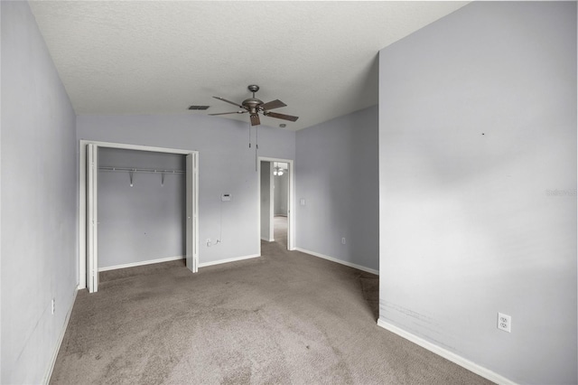 785 W Toucan Loop, Hernando, FL 34442 - unfurnished bedroom featuring carpet flooring, a closet, baseboards, ceiling fan, and vaulted ceiling