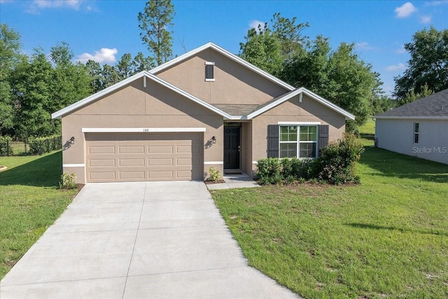 160 Hickory Course Loop, Ocala, FL 34472 - view of front facade featuring an attached garage, concrete driveway, and stucco siding