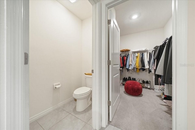 160 Hickory Course Loop, Ocala, FL 34472 - bathroom with tile patterned flooring and a spacious closet