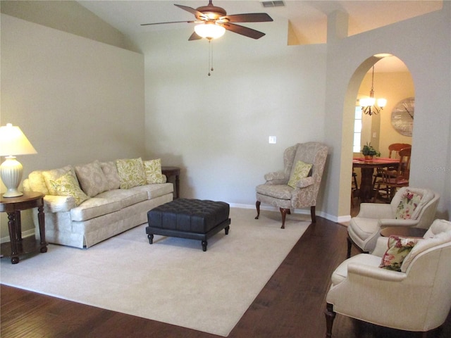 14561 SW 112th Cir, Dunnellon, FL 34432 - living area featuring arched walkways, ceiling fan, wood finished floors, lofted ceiling, and baseboards