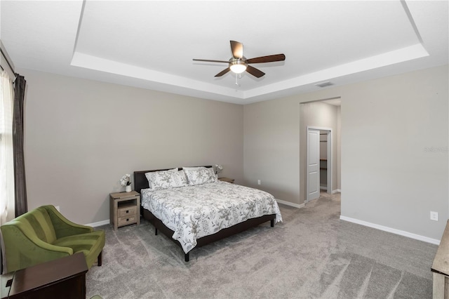 5248 Red Coral Cir, Mount Dora, FL 32757 - bedroom featuring a tray ceiling, carpet floors, baseboards, and ceiling fan