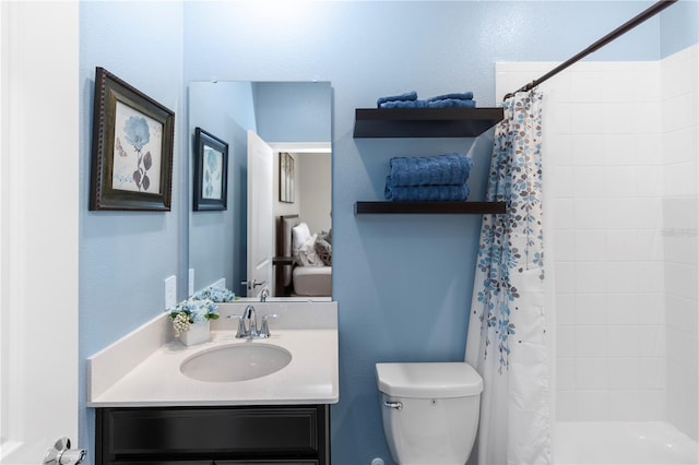 5248 Red Coral Cir, Mount Dora, FL 32757 - bathroom featuring toilet, tiled shower, and vanity