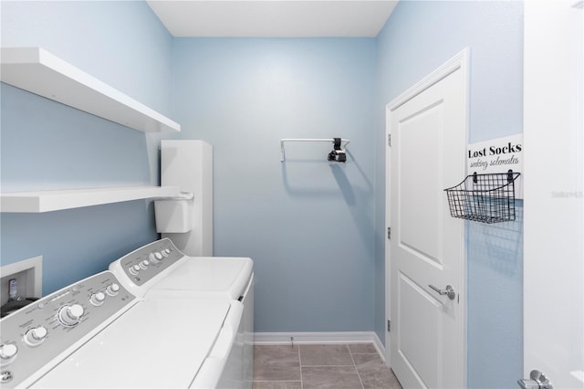 5248 Red Coral Cir, Mount Dora, FL 32757 - laundry area with washing machine and clothes dryer and baseboards