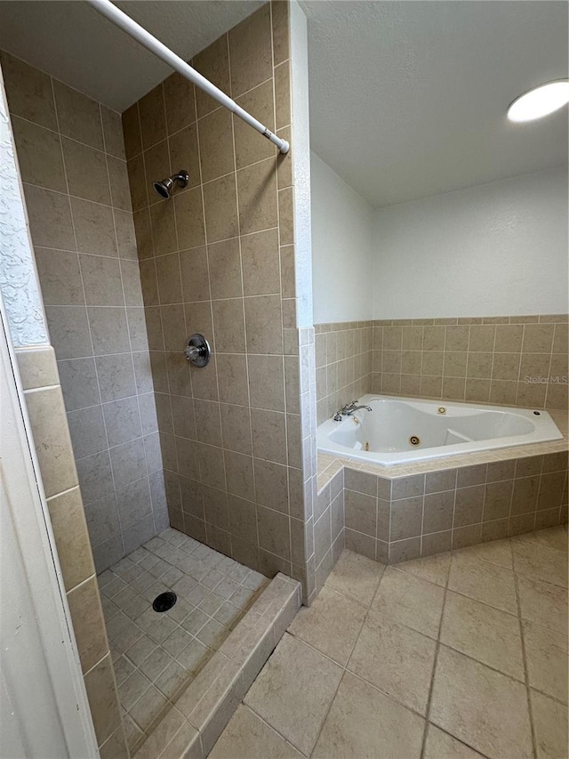 5525 SE 43rd Ct, Ocala, FL 34480 - full bathroom featuring a shower stall, a tub with jets, and tile patterned flooring