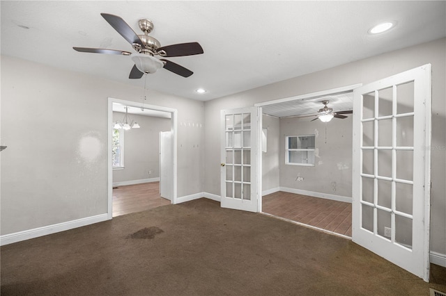 1014 NE 12th St, Ocala, FL 34470 - spare room with french doors, carpet, a ceiling fan, baseboards, and recessed lighting
