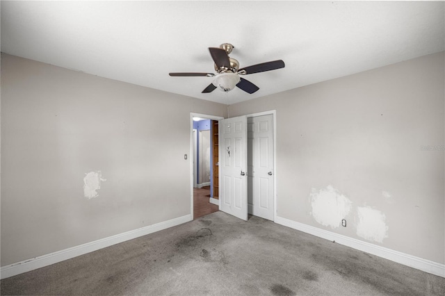 1014 NE 12th St, Ocala, FL 34470 - unfurnished bedroom with baseboards, a closet, carpet flooring, and ceiling fan
