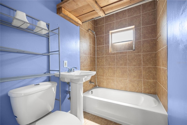 1014 NE 12th St, Ocala, FL 34470 - full bathroom with toilet, shower / washtub combination, and tile patterned flooring