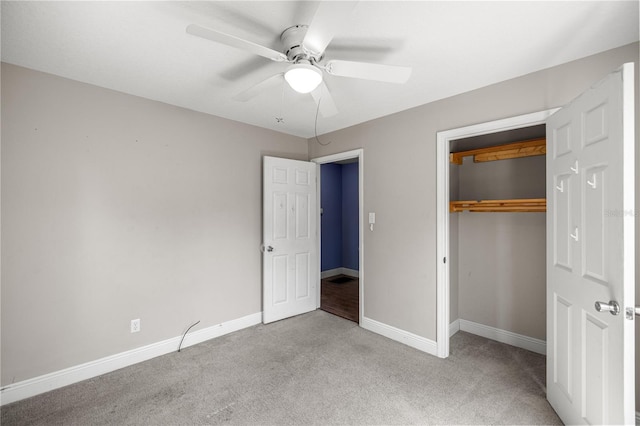 1014 NE 12th St, Ocala, FL 34470 - unfurnished bedroom with light colored carpet, baseboards, a closet, and ceiling fan