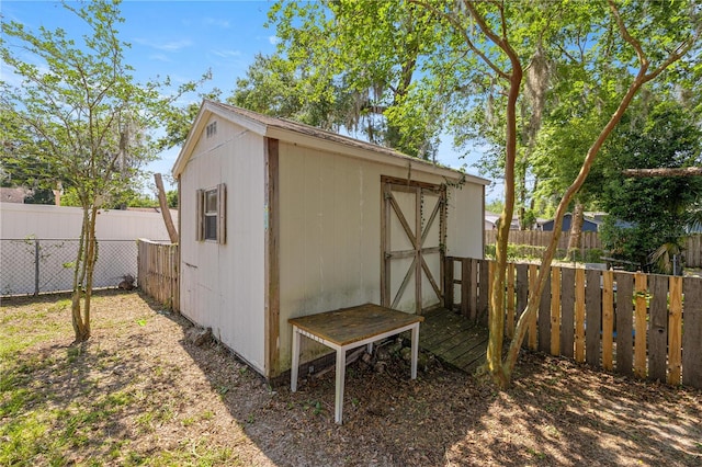 1014 NE 12th St, Ocala, FL 34470 - view of shed with a fenced backyard