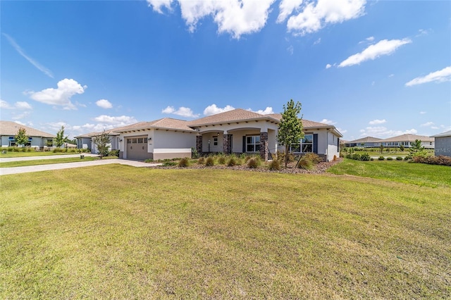 10451 SW 98th Place Rd, Ocala, FL 34481 - mediterranean / spanish house with concrete driveway, stucco siding, an attached garage, and a front yard