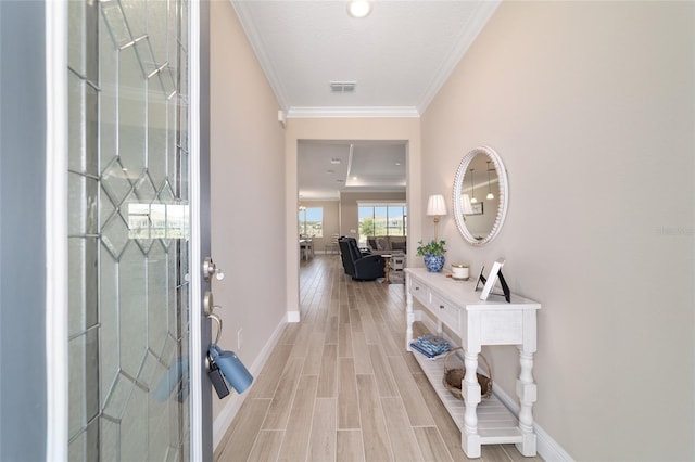 10451 SW 98th Place Rd, Ocala, FL 34481 - entrance foyer with baseboards, light wood-style flooring, and ornamental molding