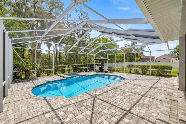1107 SE 49th Ave, Ocala, FL 34471 - view of pool featuring a patio, a pool with connected hot tub, and glass enclosure