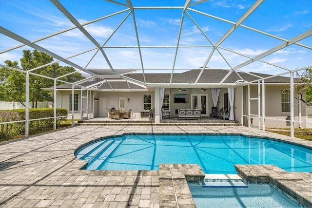 1107 SE 49th Ave, Ocala, FL 34471 - view of swimming pool with a patio area, ceiling fan, a pool with connected hot tub, and glass enclosure