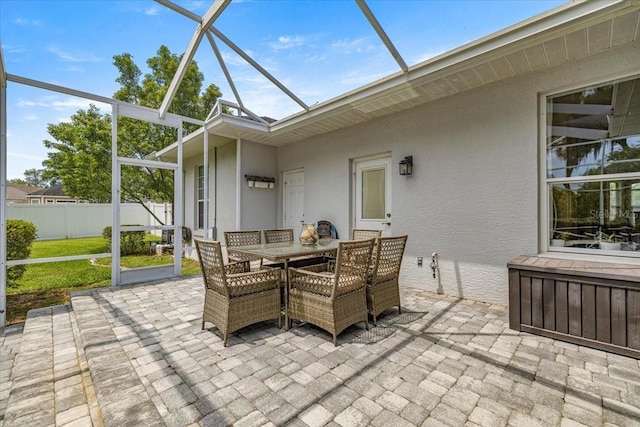 1107 SE 49th Ave, Ocala, FL 34471 - view of patio with glass enclosure and outdoor dining area