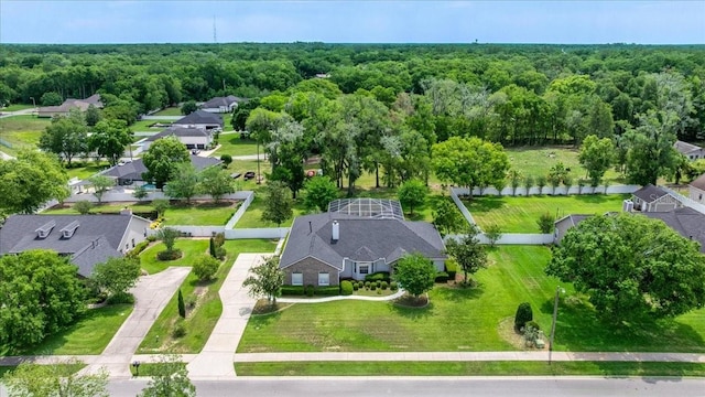1107 SE 49th Ave, Ocala, FL 34471 - aerial perspective of suburban area with a forest