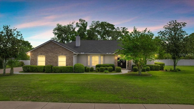 1107 SE 49th Ave, Ocala, FL 34471 - single story home featuring stone siding and a chimney