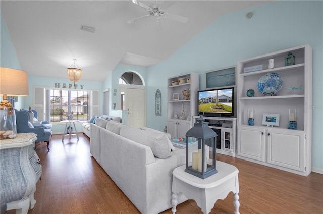 3656 E Lake Todd Dr, Hernando, FL 34442 - living room with vaulted ceiling, wood finished floors, and a ceiling fan