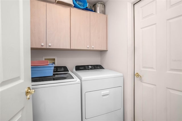 3656 E Lake Todd Dr, Hernando, FL 34442 - laundry area with cabinet space and washer and clothes dryer