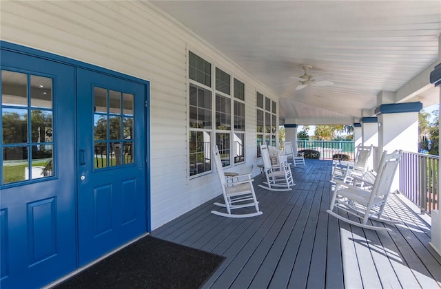 3656 E Lake Todd Dr, Hernando, FL 34442 - wooden porch with a ceiling fan