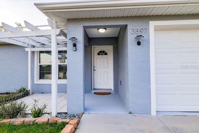 3897 SW 169th Lane Rd, Ocala, FL 34473 - entrance to property with a pergola and stucco siding