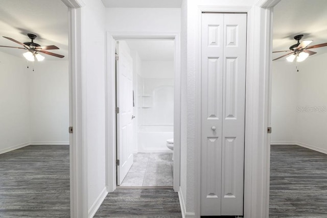 3897 SW 169th Lane Rd, Ocala, FL 34473 - hall with dark wood-type flooring and baseboards