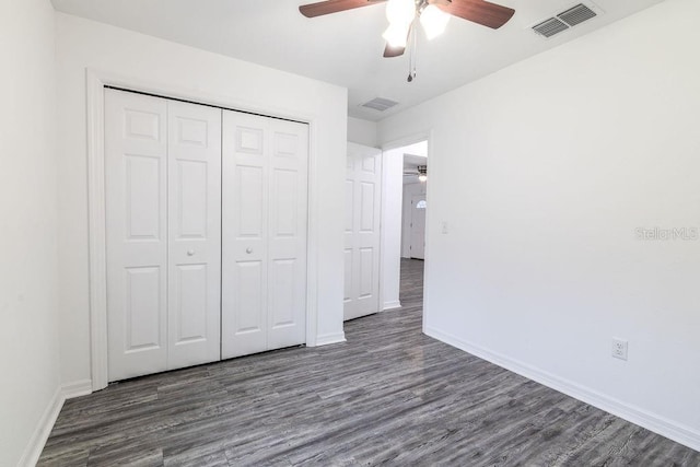 3897 SW 169th Lane Rd, Ocala, FL 34473 - unfurnished bedroom featuring wood finished floors, baseboards, a closet, and a ceiling fan