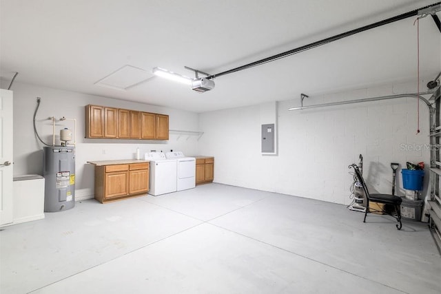 3897 SW 169th Lane Rd, Ocala, FL 34473 - garage with electric water heater, independent washer and dryer, electric panel, and a garage door opener