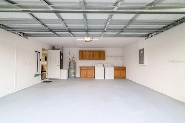 3897 SW 169th Lane Rd, Ocala, FL 34473 - garage with water heater, washer and clothes dryer, electric panel, a garage door opener, and concrete block wall