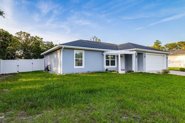 3897 SW 169th Lane Rd, Ocala, FL 34473 - ranch-style house with a gate, an attached garage, driveway, stucco siding, and roof with shingles