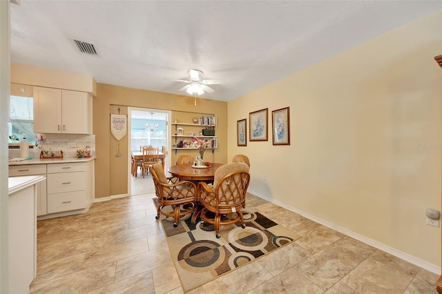 66 S Desoto St, Beverly Hills, FL 34465 - dining area with a ceiling fan and baseboards