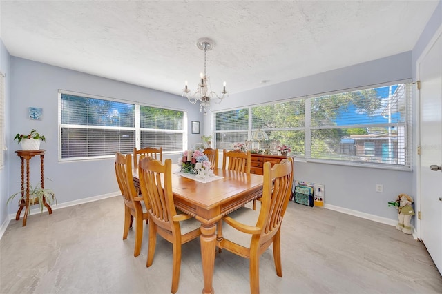 66 S Desoto St, Beverly Hills, FL 34465 - dining space with a chandelier, baseboards, and a textured ceiling