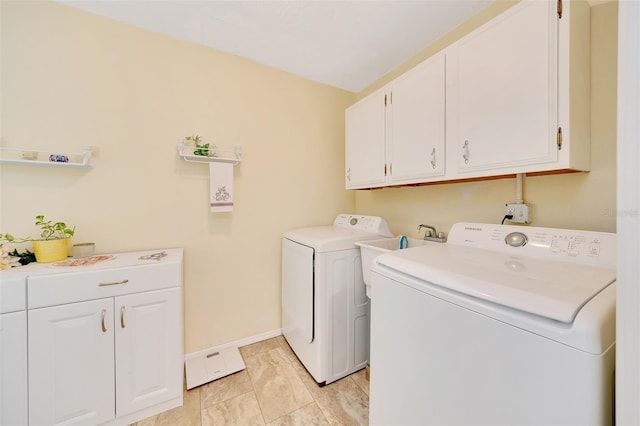 66 S Desoto St, Beverly Hills, FL 34465 - laundry area featuring cabinet space, separate washer and dryer, and baseboards