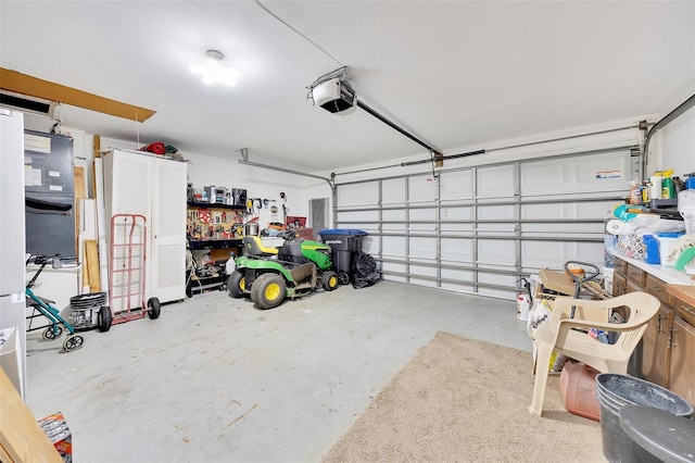 66 S Desoto St, Beverly Hills, FL 34465 - garage featuring a garage door opener