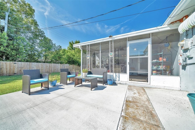 66 S Desoto St, Beverly Hills, FL 34465 - fenced backyard with a sunroom, a patio, and an outdoor hangout area