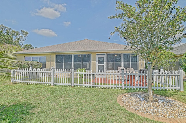 14004 SE 94th Ave, Summerfield, FL 34491 - back of house with a sunroom and stucco siding