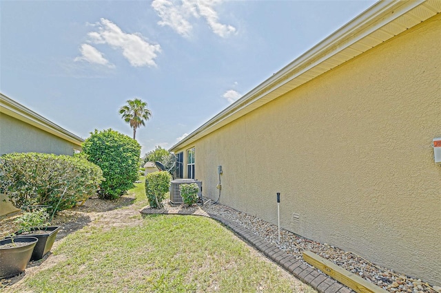 14004 SE 94th Ave, Summerfield, FL 34491 - view of green lawn featuring central AC